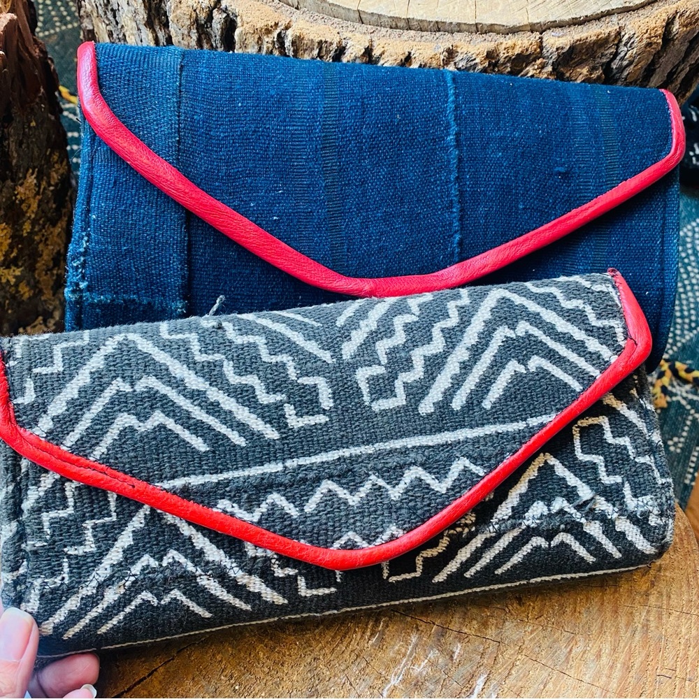 B&W African purse with Red Leather Trim Snaps to close with an inside zip pocket